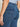 A close-up shows a person wearing Sanctuary Clothing's sculpted hayden bootcut lucky streak jeans, highlighting the high waist, front-flap back pockets, and fit at the waist, hips, and thighs. One hand is relaxed at their side.