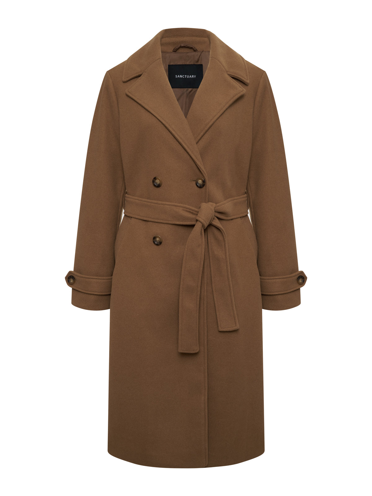 The Aria Wrap Coat Camel by Sanctuary Clothing is a long brown double-breasted trench with wide lapels, fabric belt at the waist, buttoned cuffs, and two front buttons; shown against a plain white background.