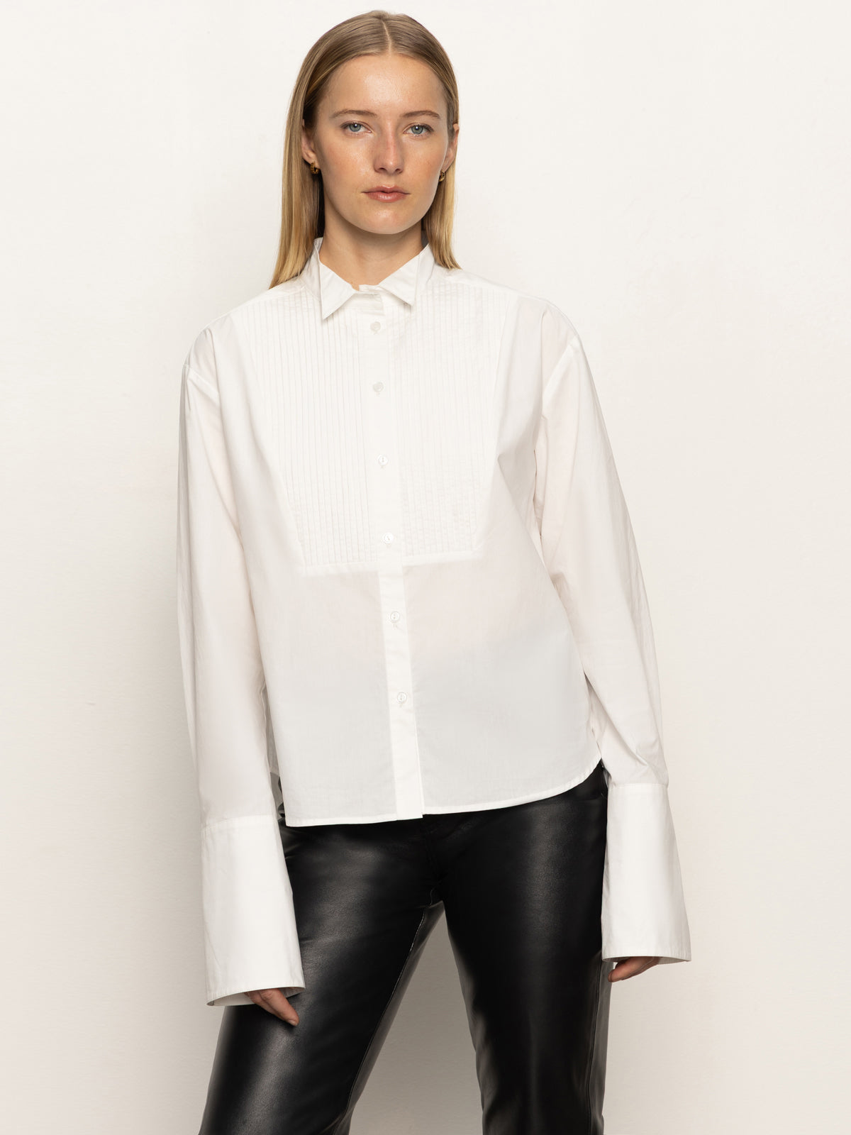 A woman wearing the Sanctuary Clothing new era tuxedo shirt in white.