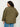 A person with curly dark hair faces away from the camera, modeling the Sanctuary Clothing reversible crafted jacket in kalamata (olive green), extended sizing, paired with blue jeans against a plain white background.