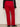 Red pants worn by a person on a plain background