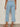 A person wearing Sanctuary Clothing's retreat crop jean skyline in petite sizing.