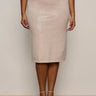 A woman models the Sanctuary Clothing sparkle sequin pencil skirt in mother of pearl (extended sizing), paired with a white top and beige heeled sandals, standing against a plain light background.