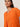 A woman with straight dark hair wears Sanctuary Clothing's "for keeps pointelle cardigan" in hibiscus orange over a matching top, standing against a plain light background with a neutral expression, looking slightly downward.