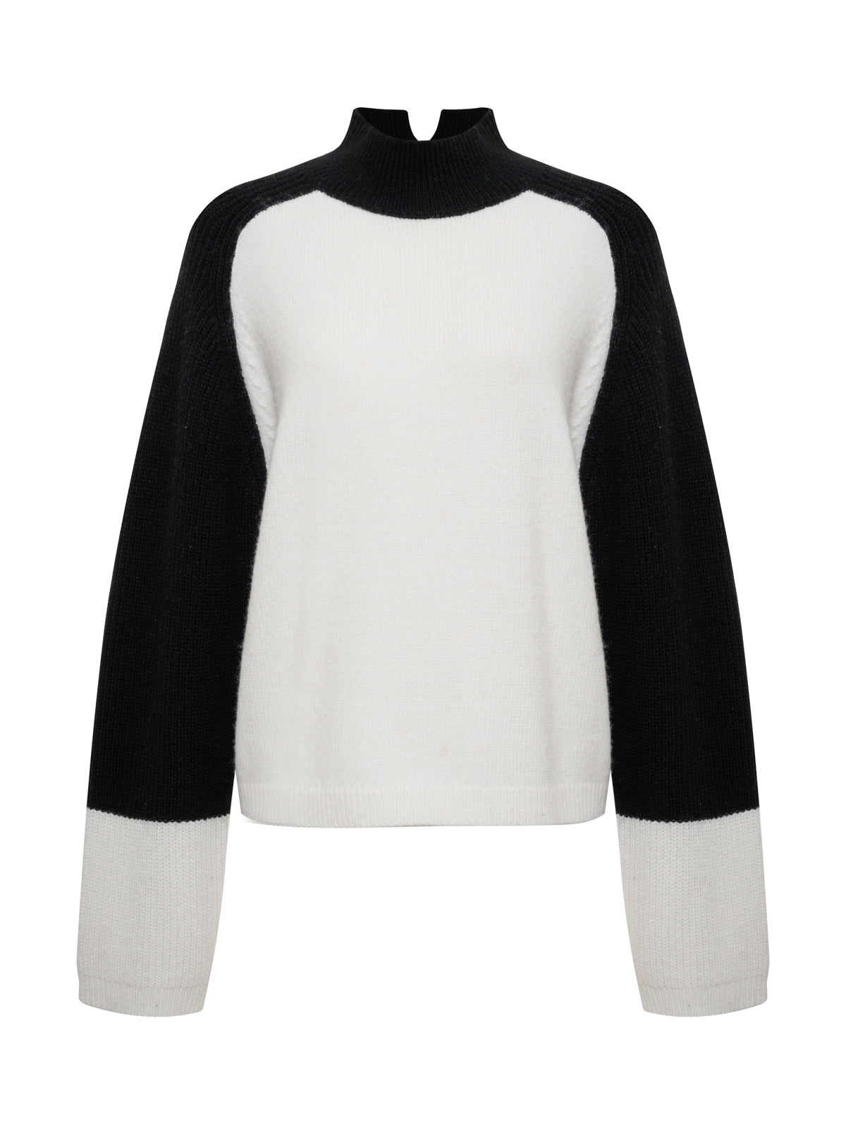 The Sanctuary Clothing downtown mock neck sweater in black chalk features a high neck, white body, and black sleeves with white cuffs for a simple, modern color-block look.