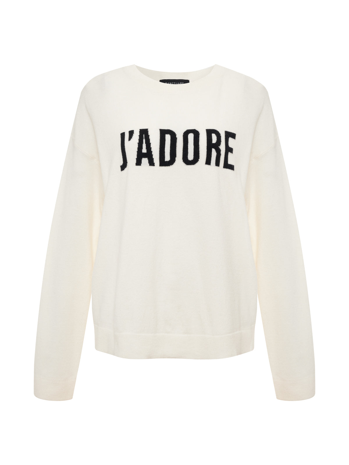 The Sanctuary Clothing 24/7 Popover Chalk with Black is a white long-sleeve sweater featuring "J'ADORE" in bold black letters across the chest, shown on a plain white background.
