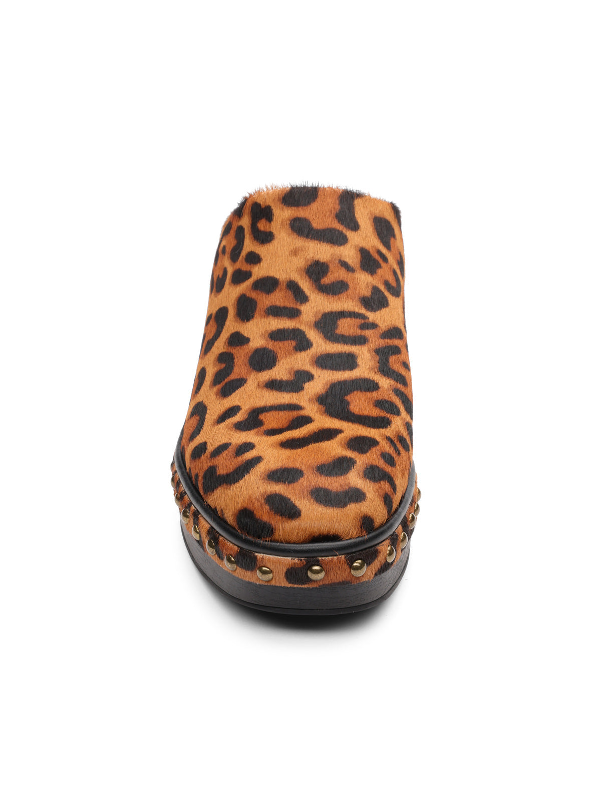 Front view of the emersyn mule bistro by Sanctuary Clothing, a slip-on clog with brown and black leopard print, fur-like texture, and metal studs around its wooden sole.