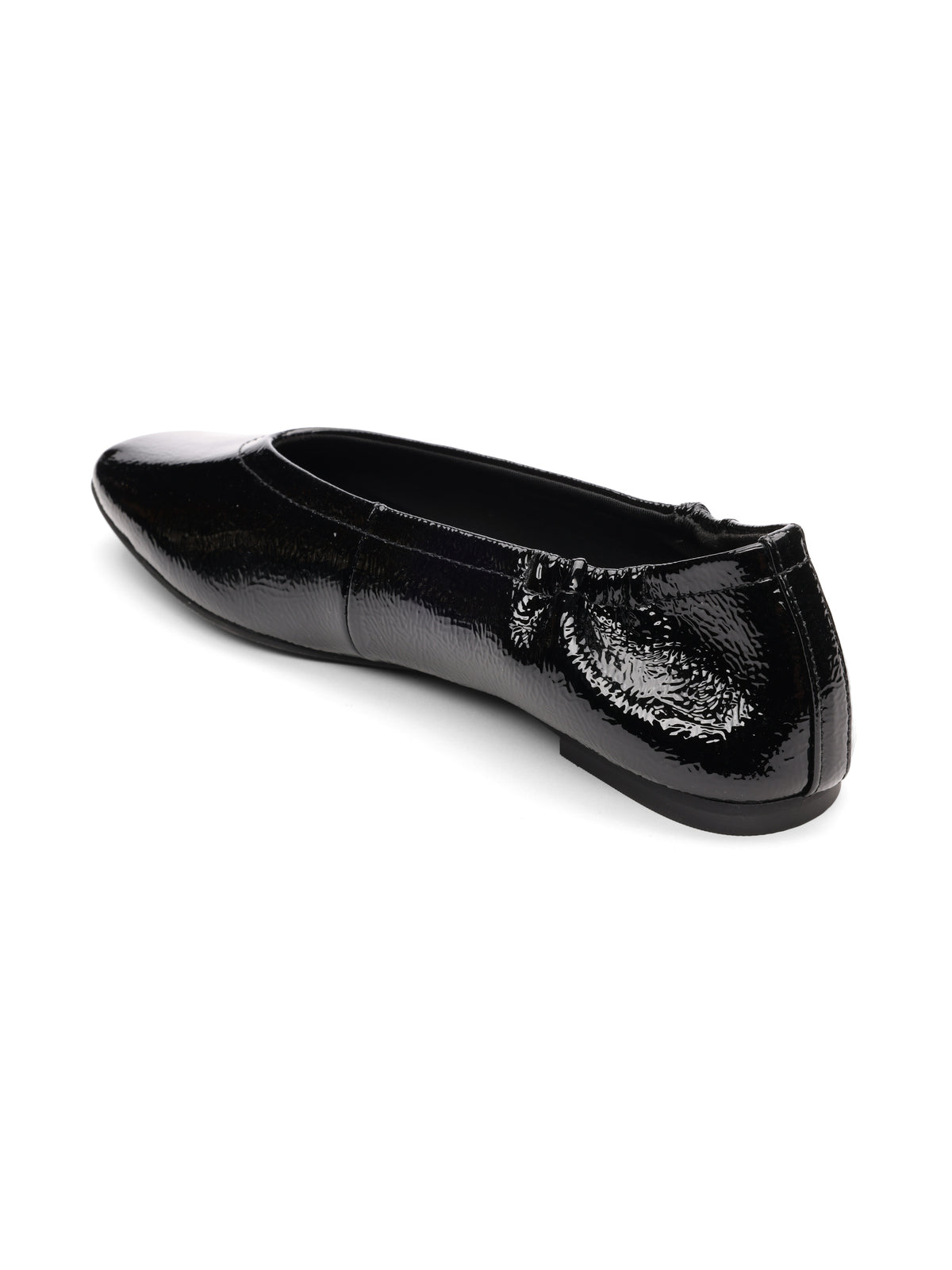The Sanctuary Clothing gigi ballet flat black is a shiny patent leather shoe with a rounded toe and low heel, shown from a back side angle on a white background.