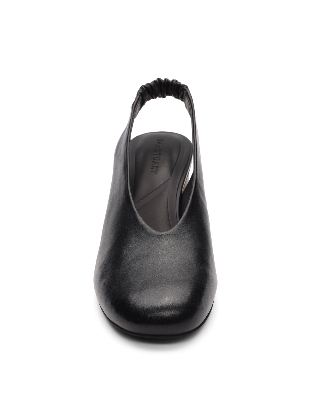 Front view of the Sanctuary Clothing opera sling back pump in black leather, featuring an elastic back strap and closed, rounded toe, displayed on a white background.