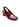 The opera sling back pump wine by Sanctuary Clothing features maroon patent leather, a rounded toe, block heel, and elasticized back strap, shown against a white background.